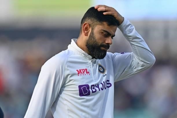 India's captain Virat Kohli reacts as he leaves the field after play on the fourth day of the fourth cricket Test match between England and India at...
