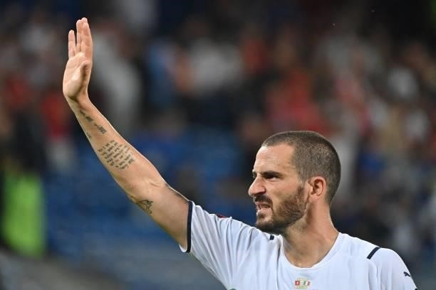 Italy's forward Leonardo Bonucci waves at supporters at the end of the World Cup 2022 qualifier football match between Switzerland and Italy, on...