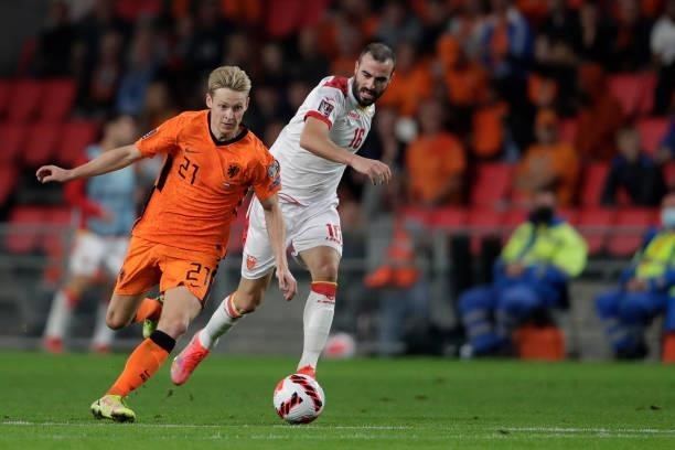 Frenkie de Jong of Holland, Milos Raickovic of Montenegro during the World Cup Qualifier match between Holland v Montenegro at the Philips Stadium on...