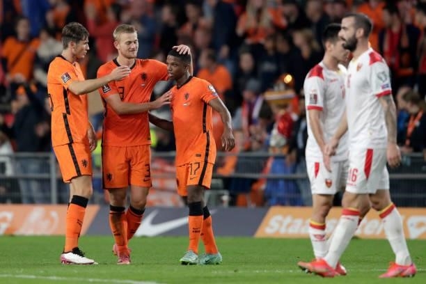 Marten de Roon of Holland, Matthijs de Ligt of Holland, Tyrell Malacia of Holland celebrate the victory during the World Cup Qualifier match between...