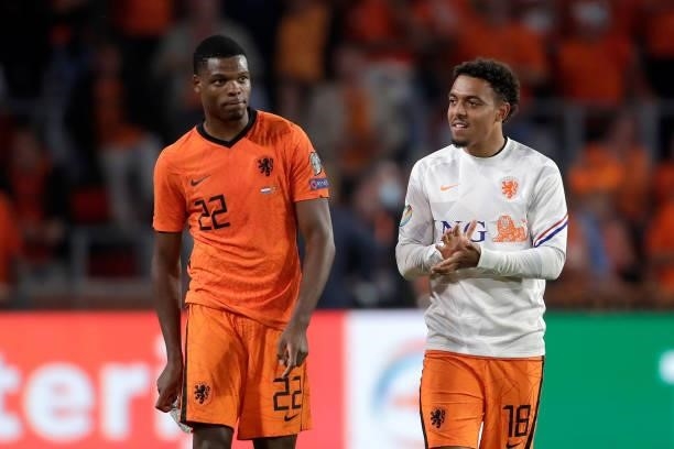 Denzel Dumfries of Holland, Donyell Malen of Holland during the World Cup Qualifier match between Holland v Montenegro at the Philips Stadium on...