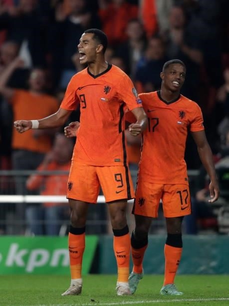 Cody Gakpo of Holland celebrates 4-0 with Tyrell Malacia of Holland during the World Cup Qualifier match between Holland v Montenegro at the Philips...