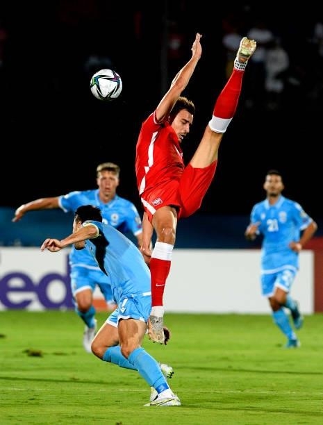 Micha Helik of Poland head the ball against Matteo Vitaioli of San Marino ,during the 2022 FIFA World Cup Qualifier match between San Marino and...