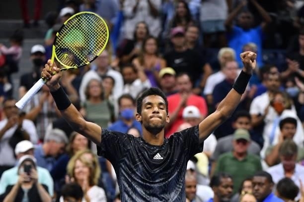 Canada's Felix Auger-Aliassime celebrates after winning his 2021 US Open Tennis tournament men's singles fourth round match against USA's Frances...