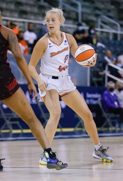 Sophie Cunningham of the Phoenix Mercury dribbles the ball during the game against the Indiana Fever at Indiana Farmers Coliseum on September 4, 2021...