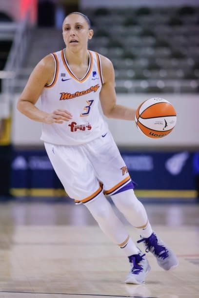 Diana Taurasi of the Phoenix Mercury brings the ball up court during the game against the Indiana Fever at Indiana Farmers Coliseum on September 4,...