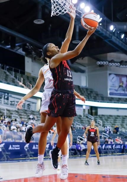 Lindsay Allen of the Indiana Fever shoots the ball during the game against the Phoenix Mercury at Indiana Farmers Coliseum on September 4, 2021 in...