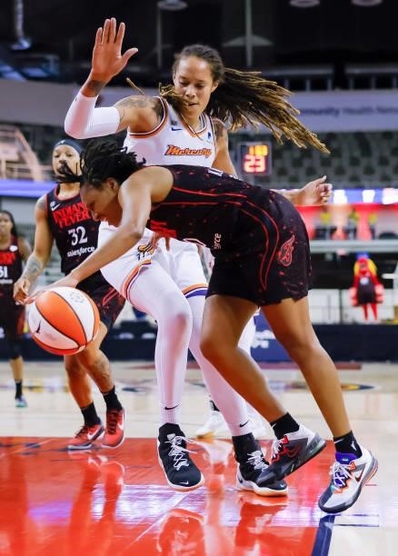 Kelsey Mitchell of the Indiana Fever drives to the basket against Brittney Griner of the Phoenix Mercury at Indiana Farmers Coliseum on September 4,...