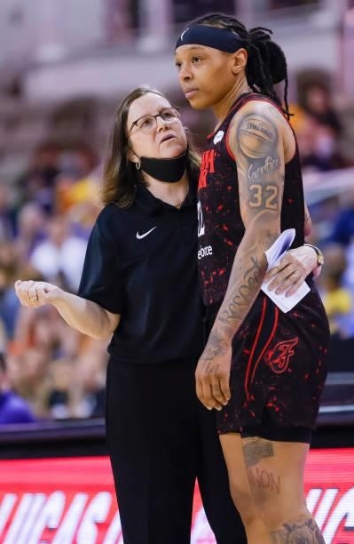 Marianne Stanley head coach of the Indiana Fever talks with Emma Cannon of the Indiana Fever during the game against the Phoenix Mercury at Indiana...