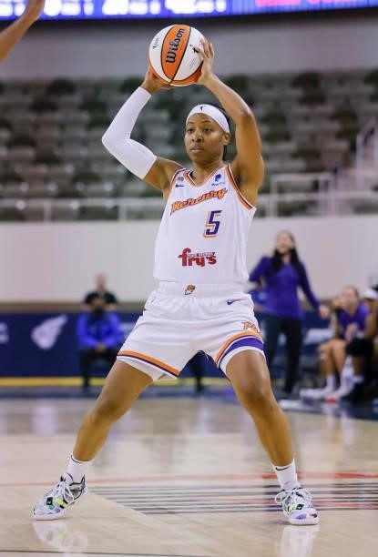 Shey Peddy of the Phoenix Mercury holds the ball during the game against the Indiana Fever at Indiana Farmers Coliseum on September 4, 2021 in...