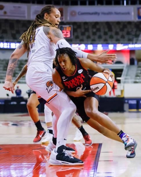 Kelsey Mitchell of the Indiana Fever drives to the basket against Brittney Griner of the Phoenix Mercury at Indiana Farmers Coliseum on September 4,...