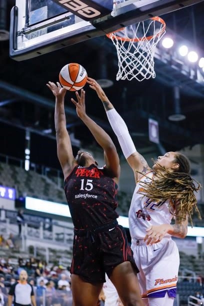 Teaira McCowan of the Indiana Fever shoots the ball against Brittney Griner of the Phoenix Mercury during the game at Indiana Farmers Coliseum on...