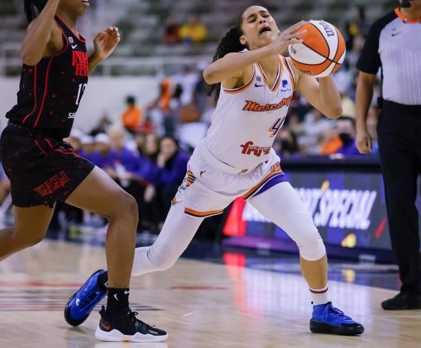 Skylar Diggins-Smith of the Phoenix Mercury dribbles the ball during the game against the Indiana Fever at Indiana Farmers Coliseum on September 4,...