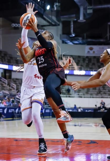 Tiffany Mitchell of the Indiana Fever shoots shoots the ball during the game against the Phoenix Mercury at Indiana Farmers Coliseum on September 4,...