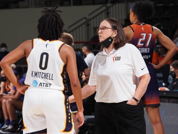 Head Coach Marianne Stanley of the Indiana Fever talks with Kelsey Mitchell during the game against the Phoenix Mercury on September 6, 2021 at...
