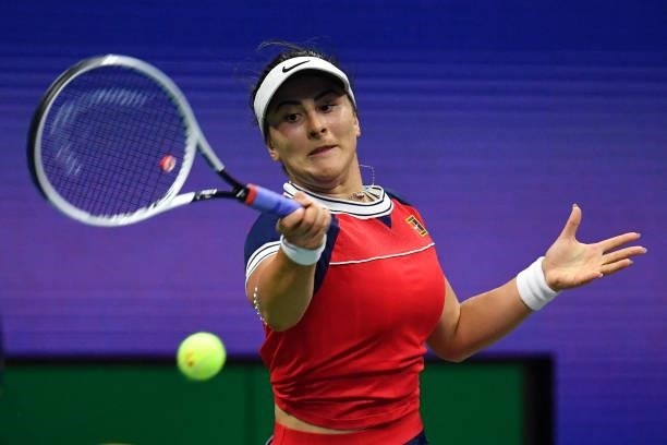 Canada's Bianca Andreescu hits a return to Greece's Maria Sakkari during their 2021 US Open Tennis tournament women's singles fourth round match at...