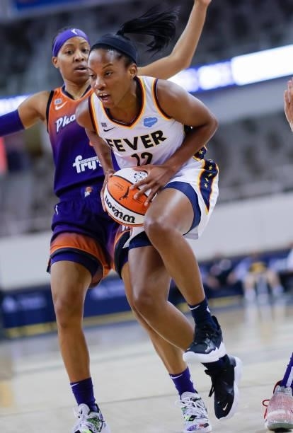 Lindsay Allen of the Indiana Fever drives to the basket during the game against the Phoenix Mercury at Indiana Farmers Coliseum on September 6, 2021...