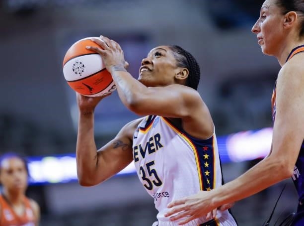 Victoria Vivians of the Indiana Fever shoots the ball during the game against the Phoenix Mercury at Indiana Farmers Coliseum on September 6, 2021 in...