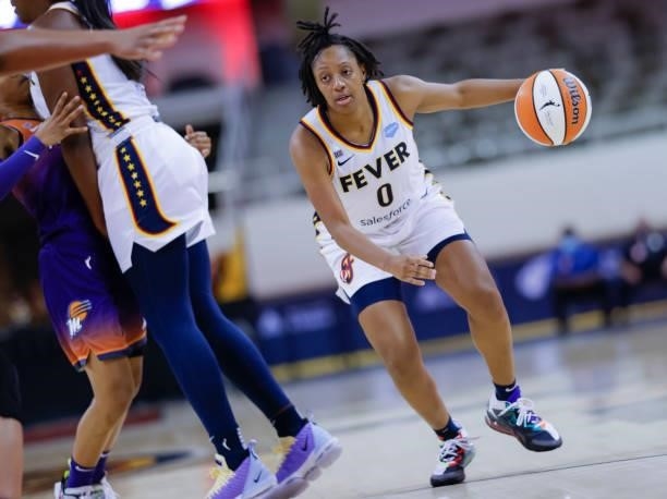 Kelsey Mitchell of the Indiana Fever dribbles the ball during the game against the Phoenix Mercury at Indiana Farmers Coliseum on September 6, 2021...