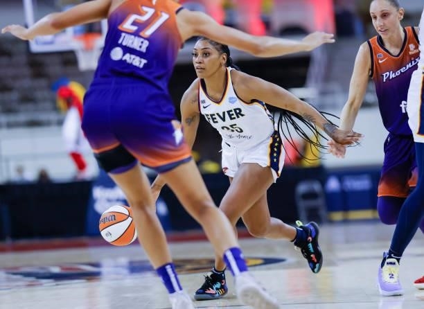 Victoria Vivians of the Indiana Fever dribbles the ball during the game against the Phoenix Mercury at Indiana Farmers Coliseum on September 6, 2021...