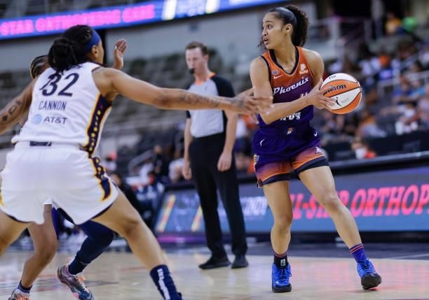 Skylar Diggins-Smith of the Phoenix Mercury holds the ball during the game against the Indiana Fever at Indiana Farmers Coliseum on September 6, 2021...