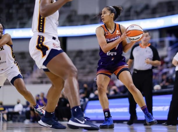 Skylar Diggins-Smith of the Phoenix Mercury holds the ball during the game against the Indiana Fever at Indiana Farmers Coliseum on September 6, 2021...