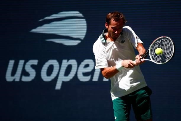 Russia's Daniil Medvedev hits a return to Netherlands' Botic van de Zandschulp during their 2021 US Open Tennis tournament men's quarter-finals match...