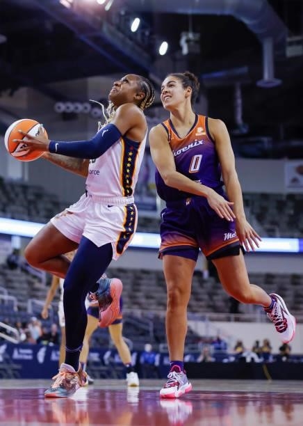 Tiffany Mitchell of the Indiana Fever drives to the basket against Kia Nurse of the Phoenix Mercury at Indiana Farmers Coliseum on September 6, 2021...