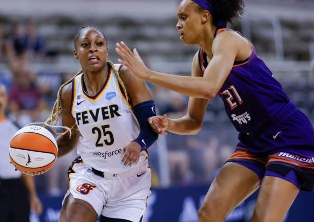 Tiffany Mitchell of the Indiana Fever dribbles the ball during the game against the Phoenix Mercury at Indiana Farmers Coliseum on September 6, 2021...