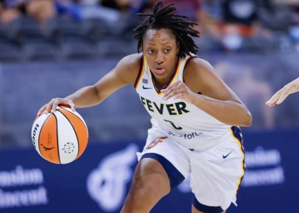 Kelsey Mitchell of the Indiana Fever dribbles the ball during the game against the Phoenix Mercury at Indiana Farmers Coliseum on September 6, 2021...