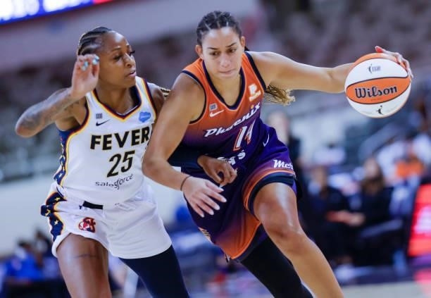 Bria Hartley of the Phoenix Mercury dribbles the ball against Tiffany Mitchell of the Indiana Fever at Indiana Farmers Coliseum on September 6, 2021...
