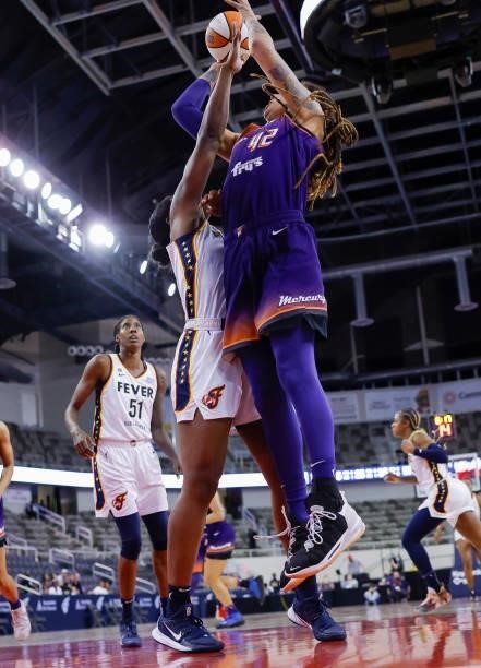 Brittney Griner of the Phoenix Mercury shoots the ball against Teaira McCowan of the Indiana Fever at Indiana Farmers Coliseum on September 6, 2021...