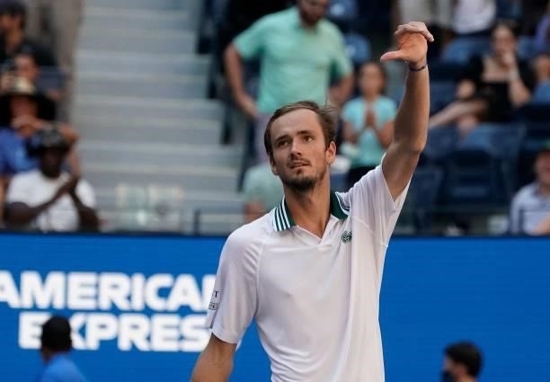 Russia's Daniil Medvedev waves as he celebrates his win over Netherlands' Botic van de Zandschulp during their 2021 US Open Tennis tournament men's...
