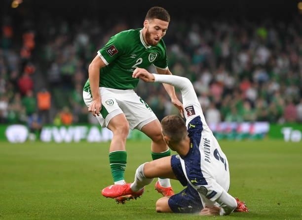 Dublin , Ireland - 7 September 2021; Matt Doherty of Republic of Ireland is fouled by Strahinja Pavlovi of Serbia during the FIFA World Cup 2022...