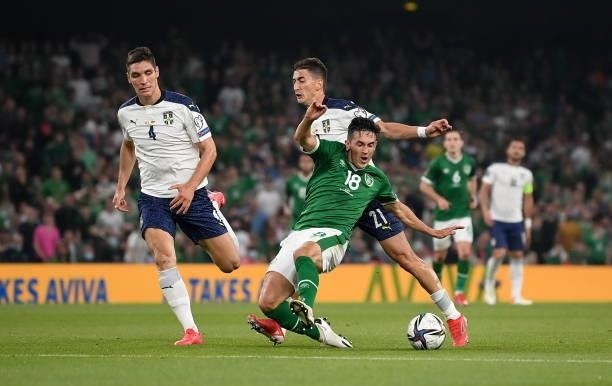 Dublin , Ireland - 7 September 2021; Jamie McGrath of Republic of Ireland is fouled by Filip Djurii of Serbia during the FIFA World Cup 2022...