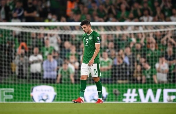 Dublin , Ireland - 7 September 2021; John Egan of Republic of Ireland reacts after his side conceded their first goal during the FIFA World Cup 2022...