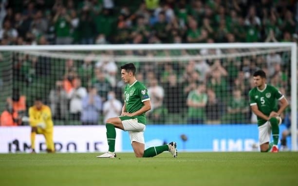 Dublin , Ireland - 7 September 2021; Jamie McGrath of Republic of Ireland takes a knee before the FIFA World Cup 2022 qualifying group A match...