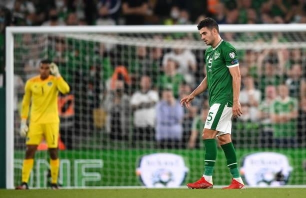 Dublin , Ireland - 7 September 2021; John Egan of Republic of Ireland reacts after his side conceded their first goal during the FIFA World Cup 2022...