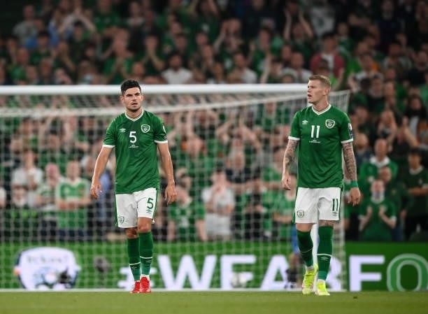 Dublin , Ireland - 7 September 2021; John Egan, left, and James McClean of Republic of Ireland react after their side conceded a goal during the FIFA...