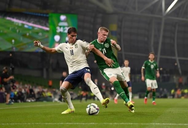 Dublin , Ireland - 7 September 2021; Duan Vlahovi of Serbia in action against James McClean of Republic of Ireland during the FIFA World Cup 2022...