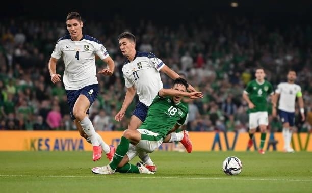 Dublin , Ireland - 7 September 2021; Jamie McGrath of Republic of Ireland is fouled by Filip Djurii of Serbia during the FIFA World Cup 2022...