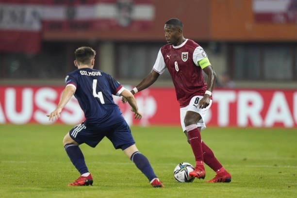 Billy Gilmour of Scotland and David Alaba of Austria during the 2022 FIFA World Cup Qualifier match between Austria and Scotland at Ernst Happel...