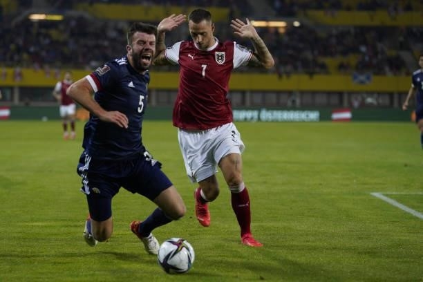 Grant Hanley of Scotland and Marko Arnautovic of Austria during the 2022 FIFA World Cup Qualifier match between Austria and Scotland at Ernst Happel...