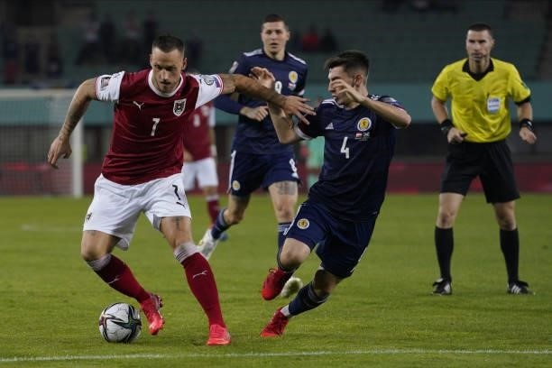 Marko Arnautovic of Austria and Billy Gilmour of Scotland during the 2022 FIFA World Cup Qualifier match between Austria and Scotland at Ernst Happel...