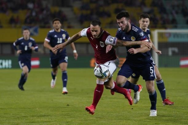 Marko Arnautovic of Austria and Grant Hanley of Scotland during the 2022 FIFA World Cup Qualifier match between Austria and Scotland at Ernst Happel...