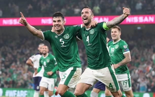 Republic of Ireland's defender John Egan and Republic of Ireland's defender Shane Duffy celebrate after Serbia's defender Nikola Milenkovic scored an...