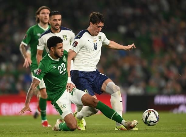 Dublin , Ireland - 7 September 2021; Duan Vlahovi of Serbia in action against John Egan of Republic of Ireland during the FIFA World Cup 2022...