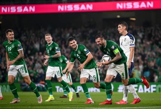 Dublin , Ireland - 7 September 2021; Republic of Ireland players, from left, James Collins, James McClean, John Egan and Shane Duffy celebrate after...