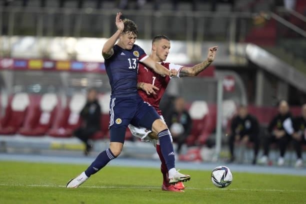 Jack Hendry of Scotland and Marko Arnautovic of Austria during the 2022 FIFA World Cup Qualifier match between Austria and Scotland at Ernst Happel...