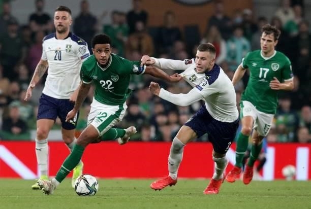 Republic of Ireland's defender Andrew Omobamidele vies with Serbia's defender Strahinja Pavlovic during the FIFA World Cup Qatar 2022 qualifying...